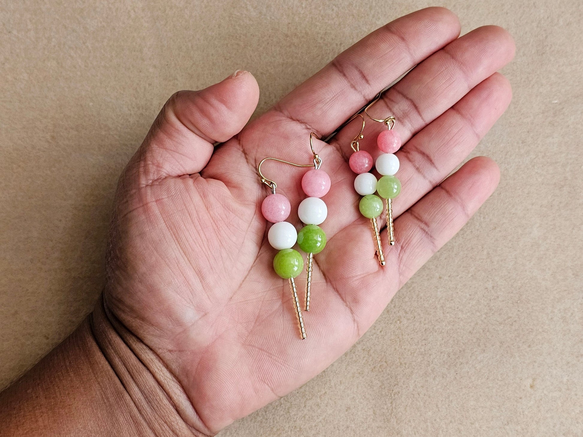 Pink, white and green earrings.