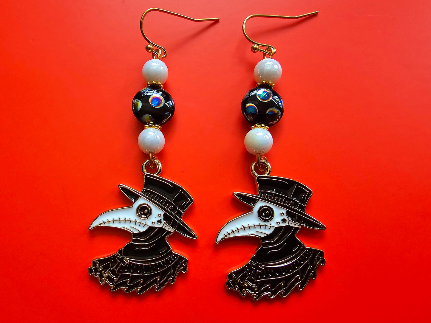 Beaded plague doctor earrings with virus cells