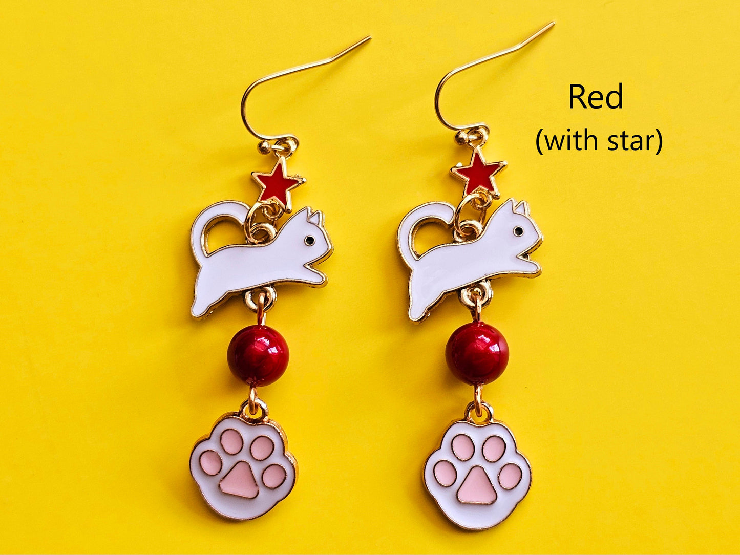 Red star cat earrings.
Celestial earrings, star earrings.