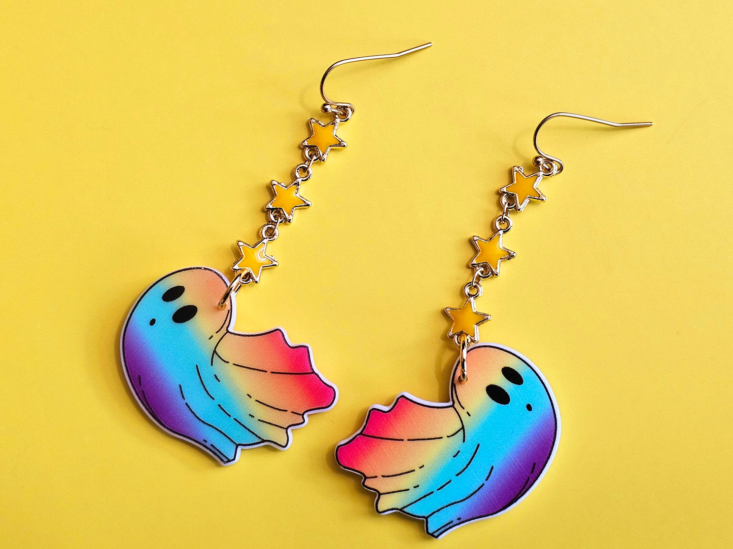 Flying ghost earrings with hypoallergenic ear wires.