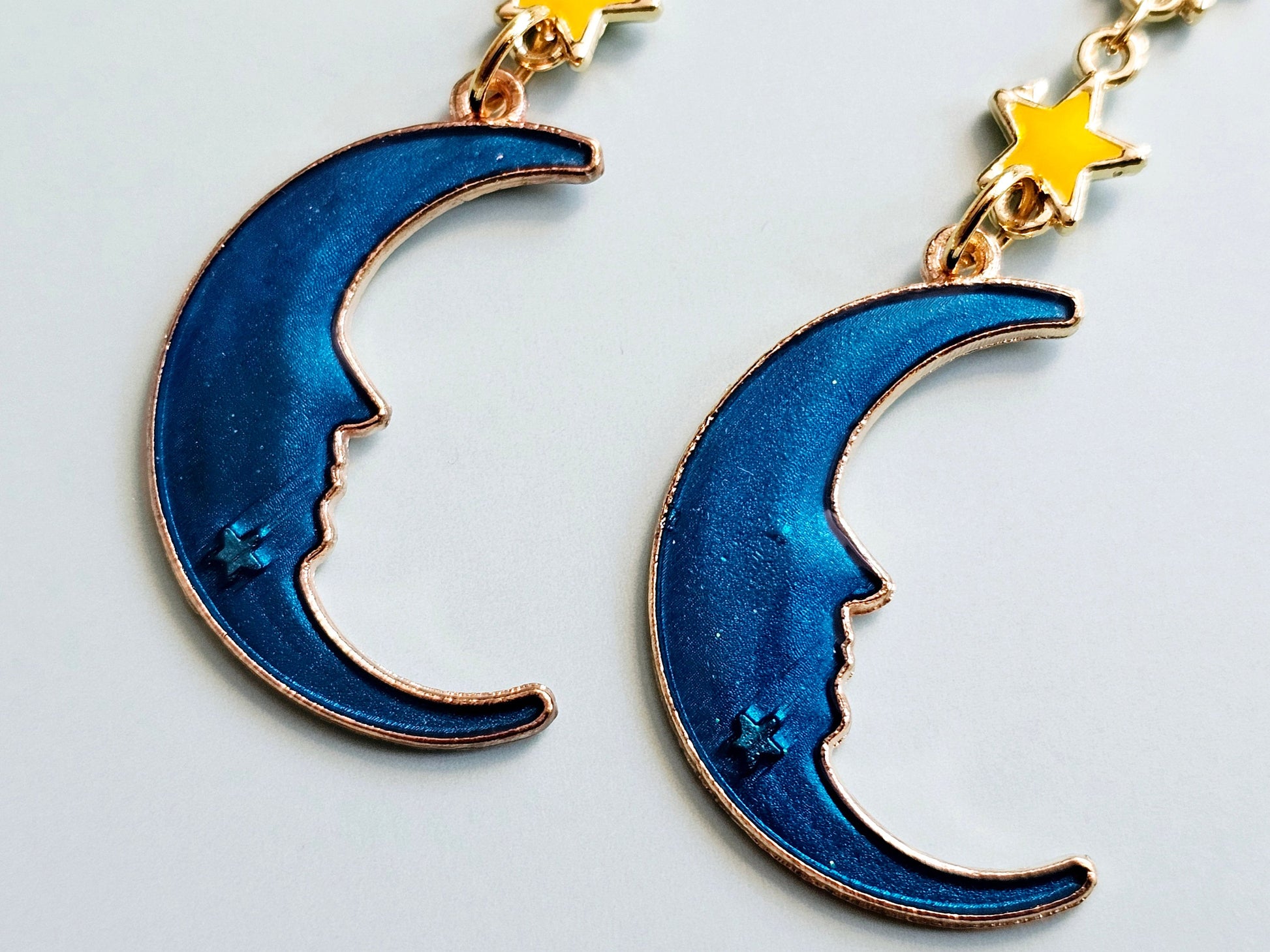 Blue crescent moon details.