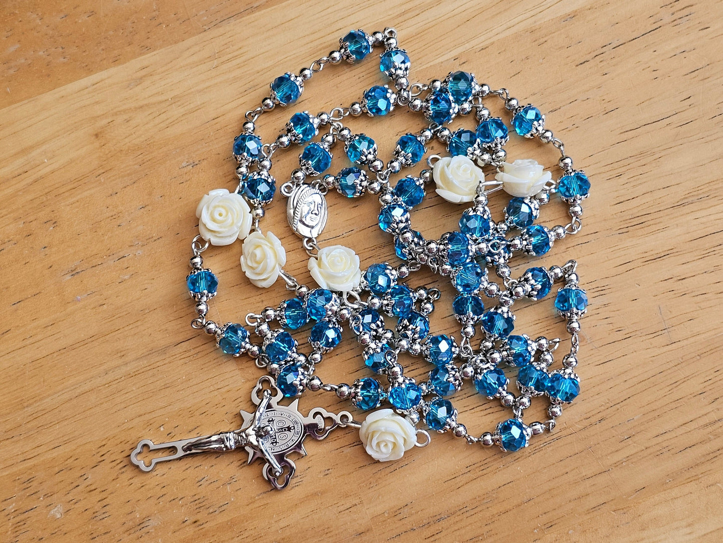 Gorgeous blue and white rosary of 50 inches of chain.