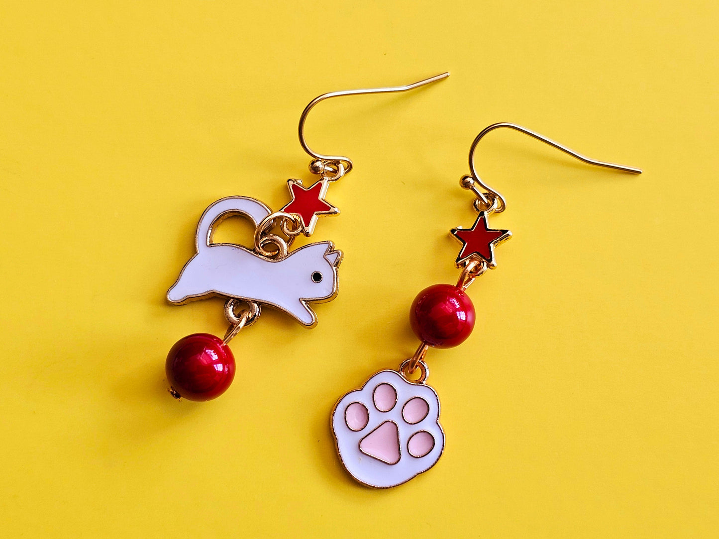 Playful earrings gifts for her.