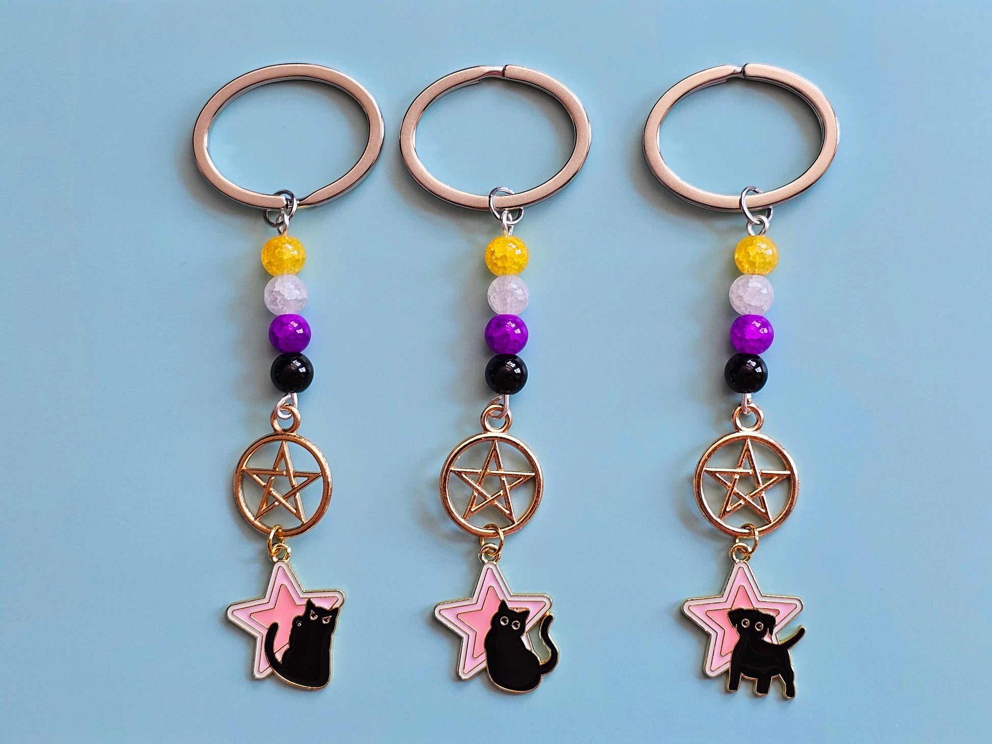 Nonbinary keychains. Cat keychain cat keyring dog keychain dog keyring.