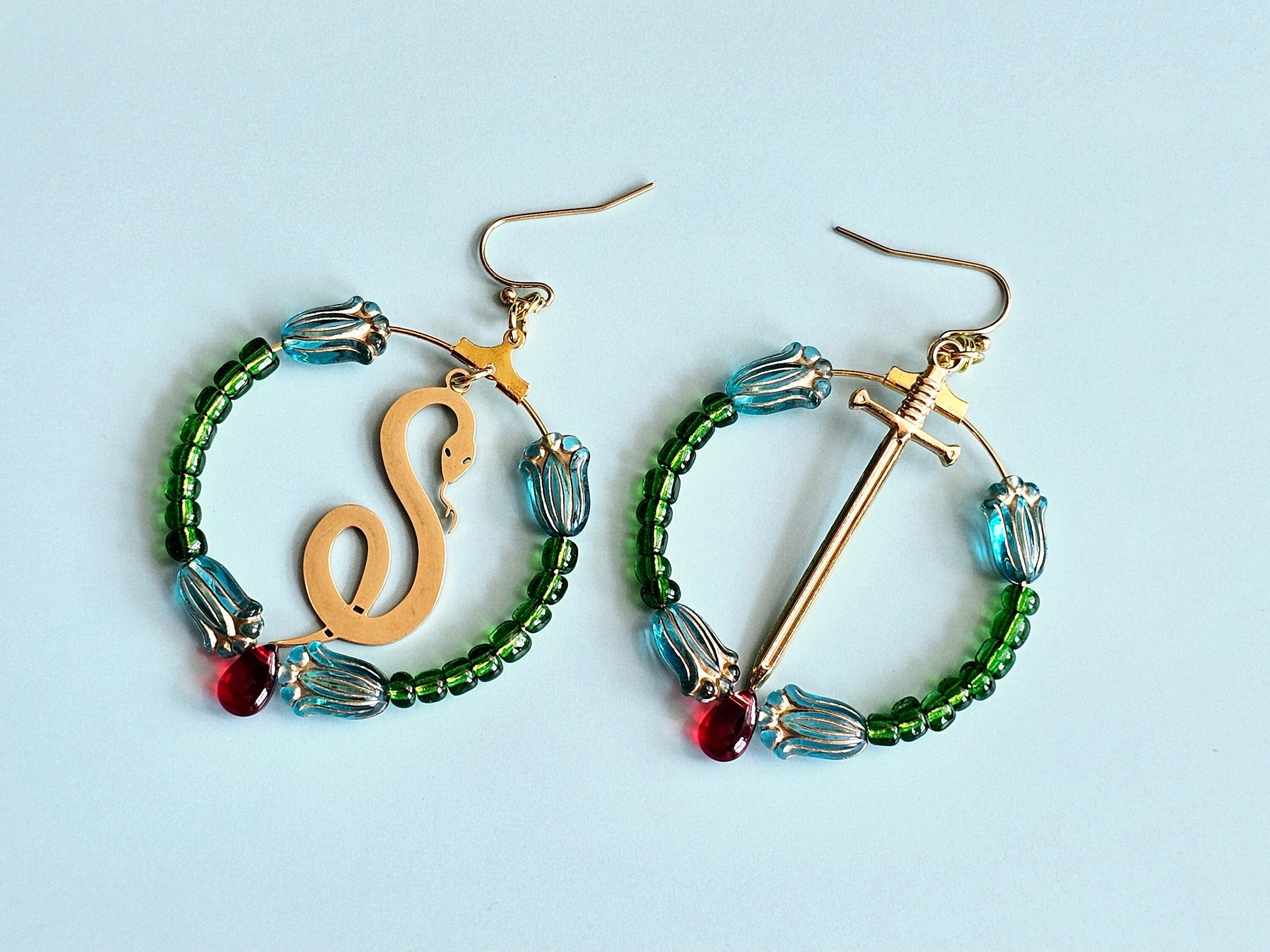 Green and gold hoop earrings.