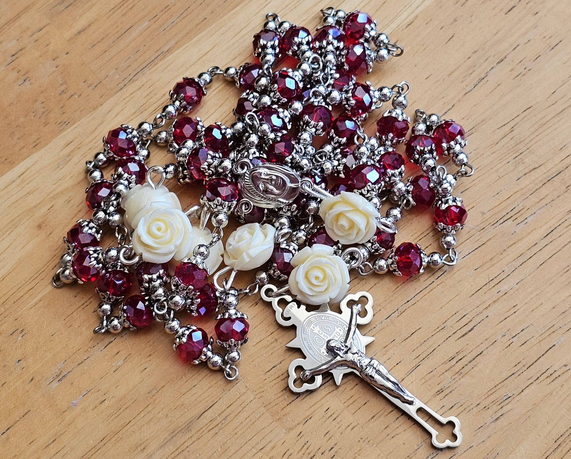 Gorgeous handmade rosary with stainless steel Madonna and crucifix.