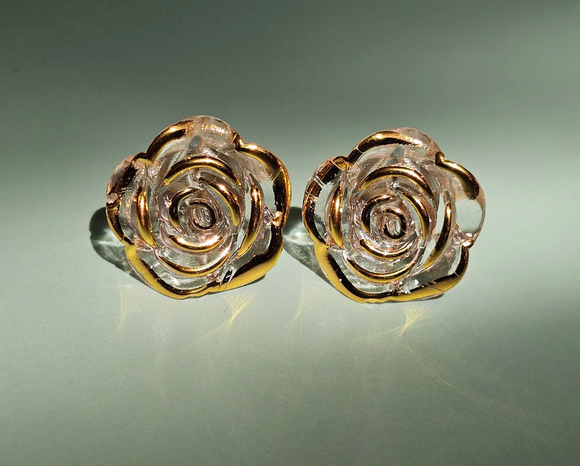 Rose stud earrings with titanium surgical steel or acrylic ear posts.