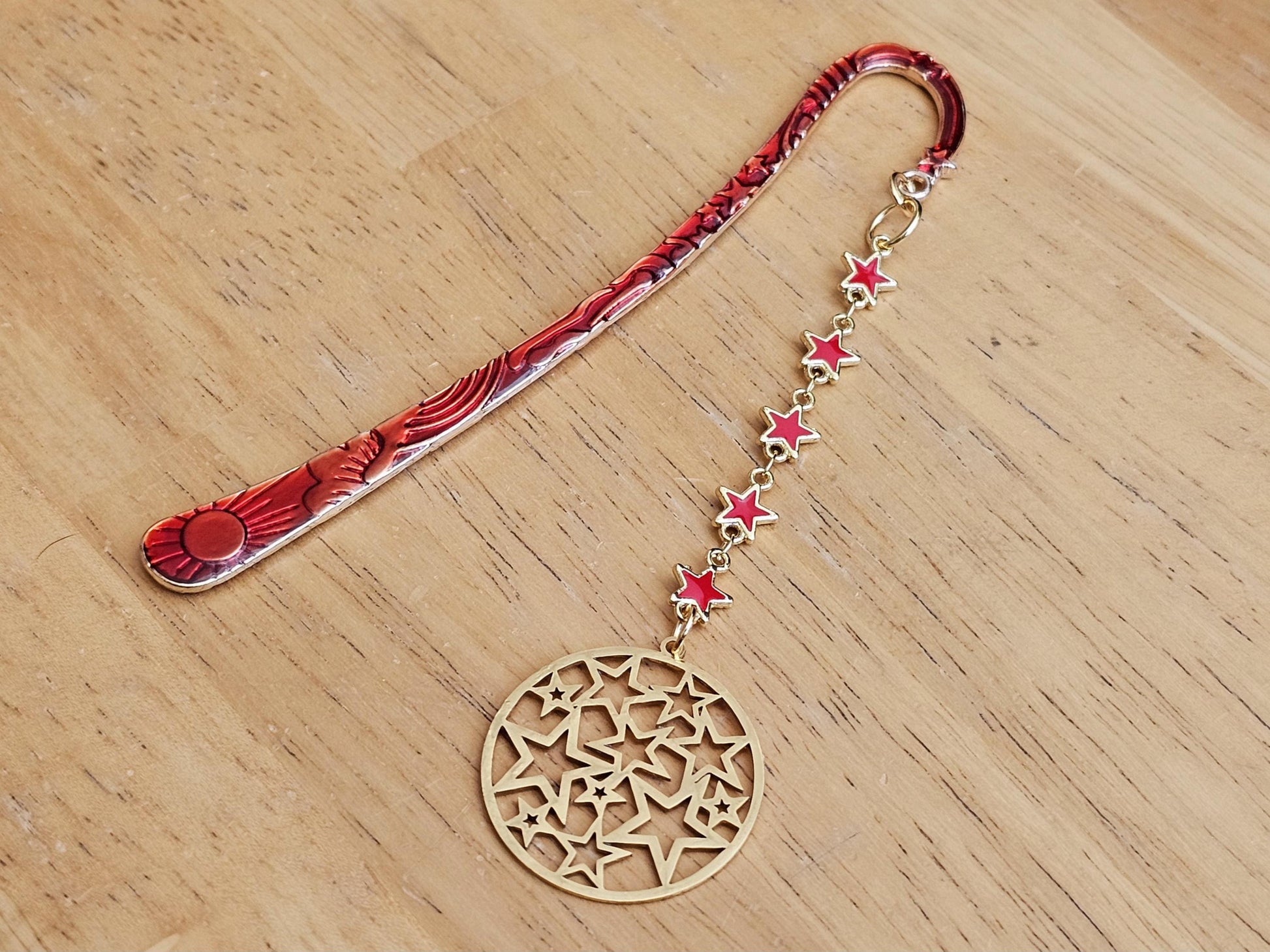 Steel and enamel bookmark with stars.