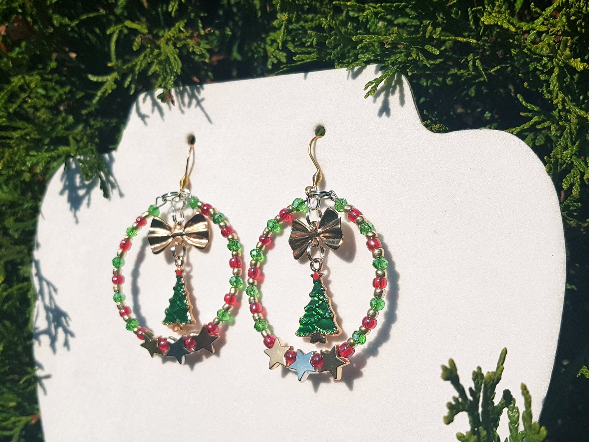 Statement Earrings in festive Christmas colours of green, red, gold and silver.