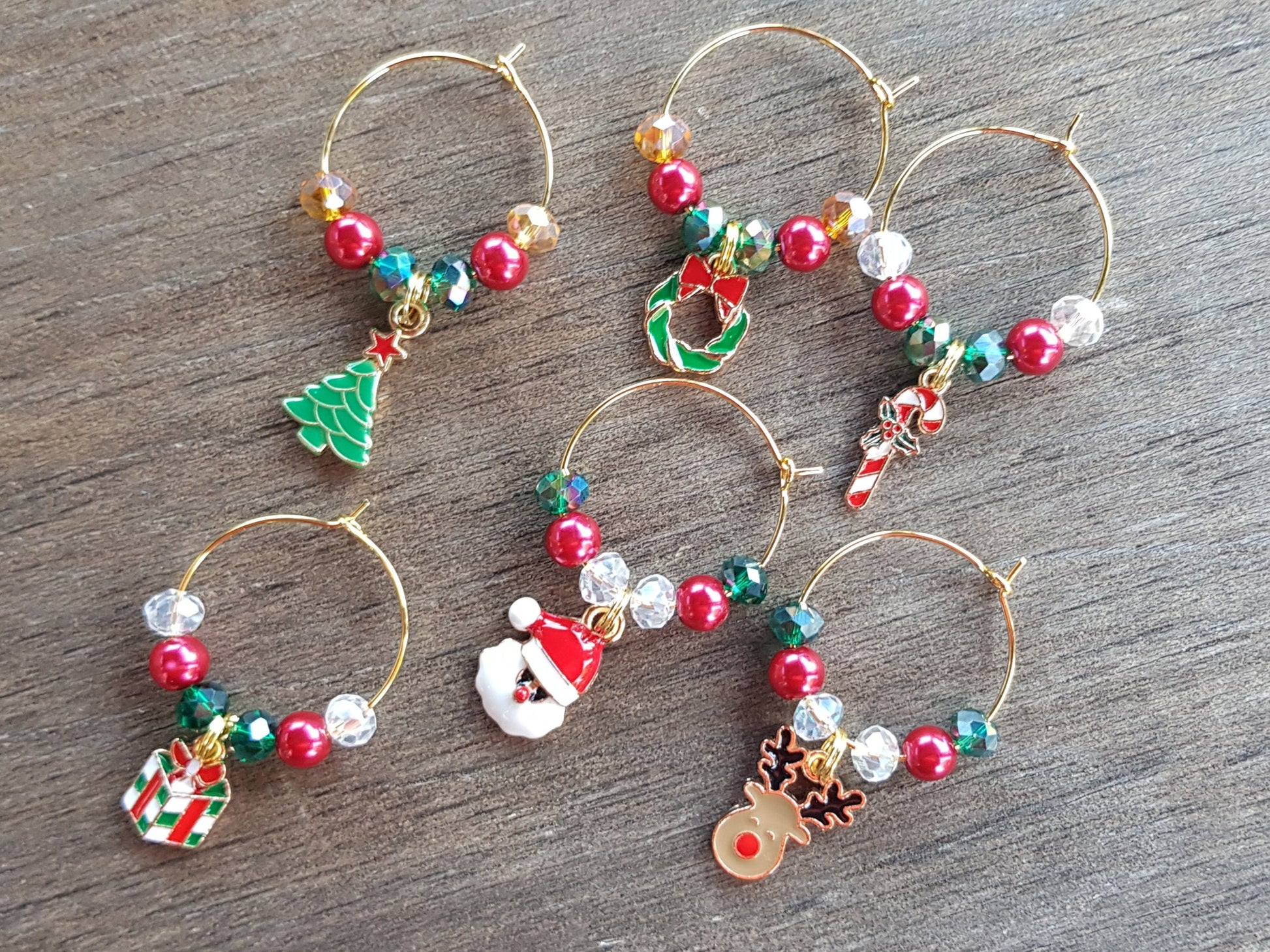 Set of 6 Christmas wine and champagne glass charms.