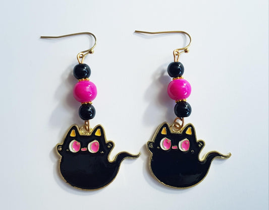 Black cat earrings with hypoallergenic ear wires. Black cat ghost earrings with pink and black beads.