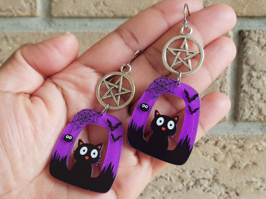 Black cat earrings for Halloween featuring a pentagram or pentacle, spiders and bats.