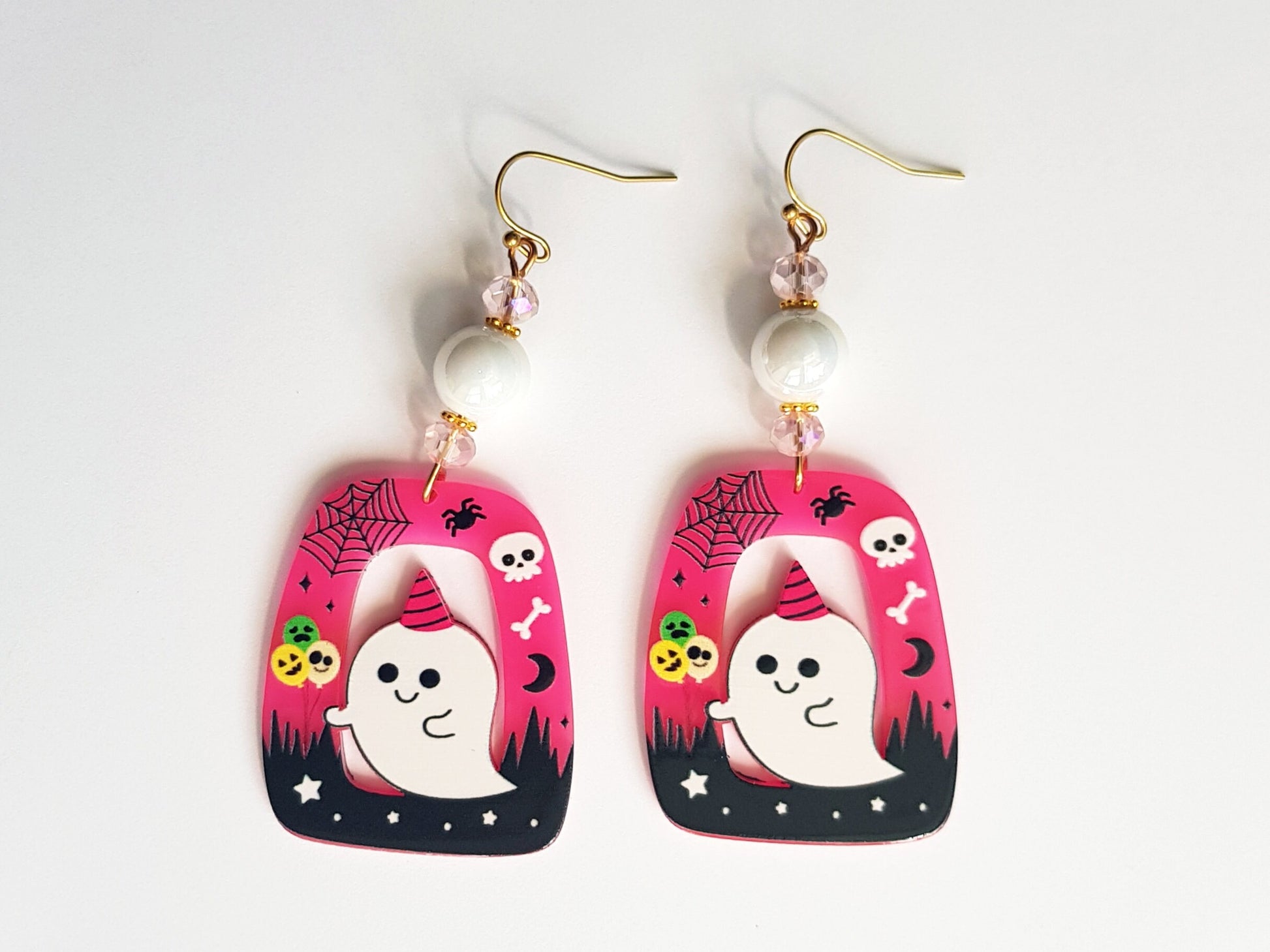 Ghost earrings with hypoallergenic ear wires.