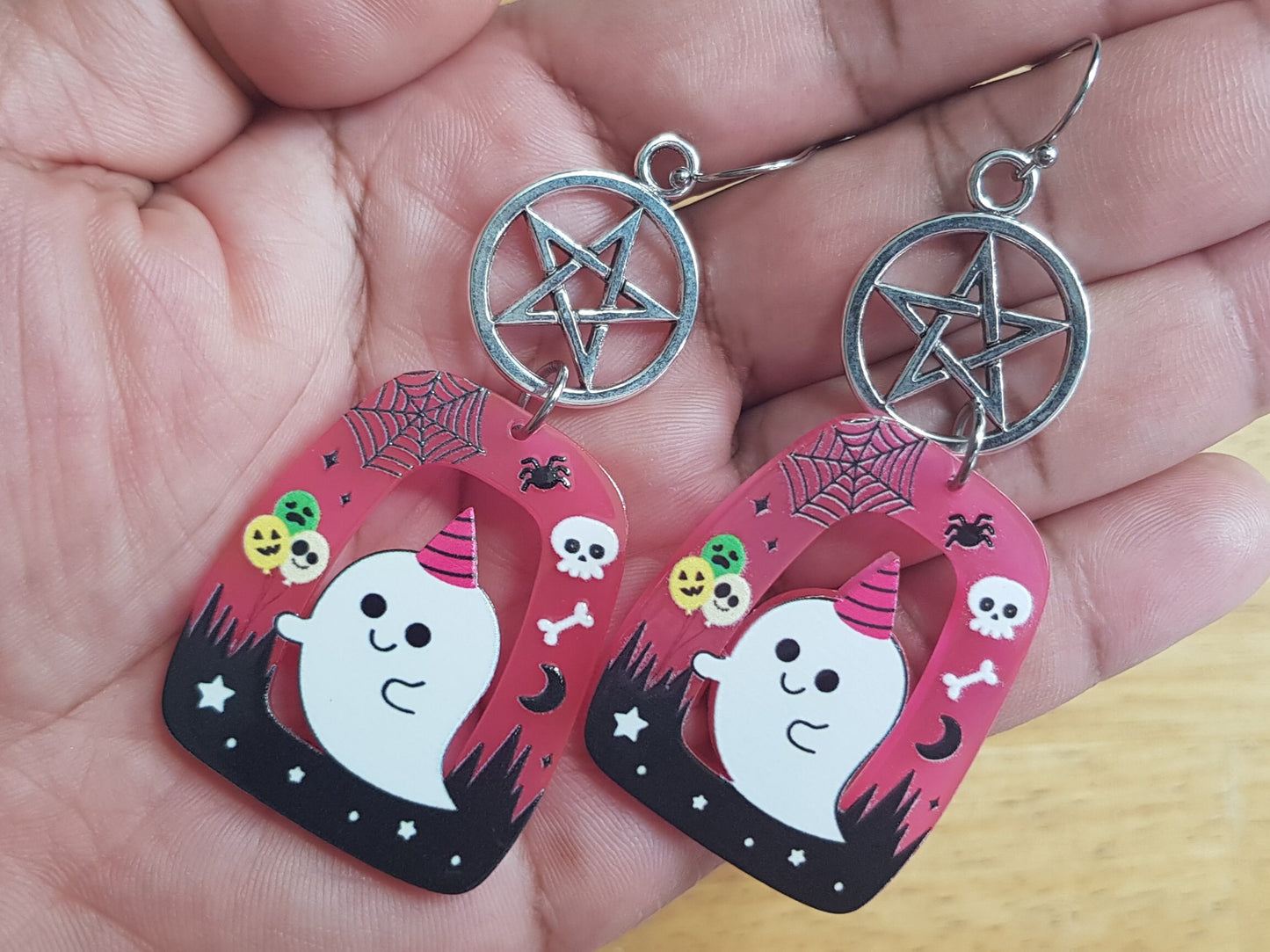 Ghost in party hat earrings. Pink with white and black.