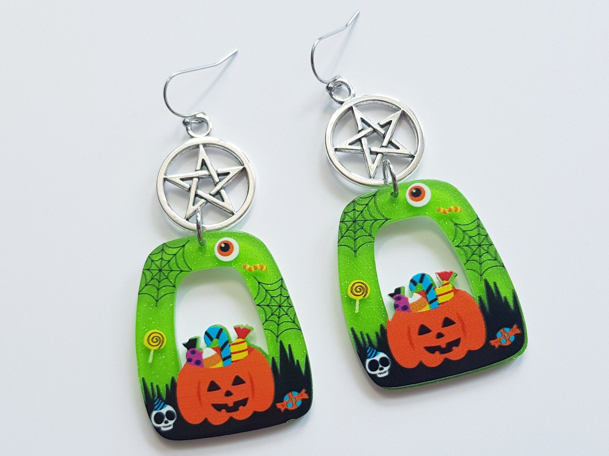 Halloween earrings with  pentagrams and Jack o lanterns.