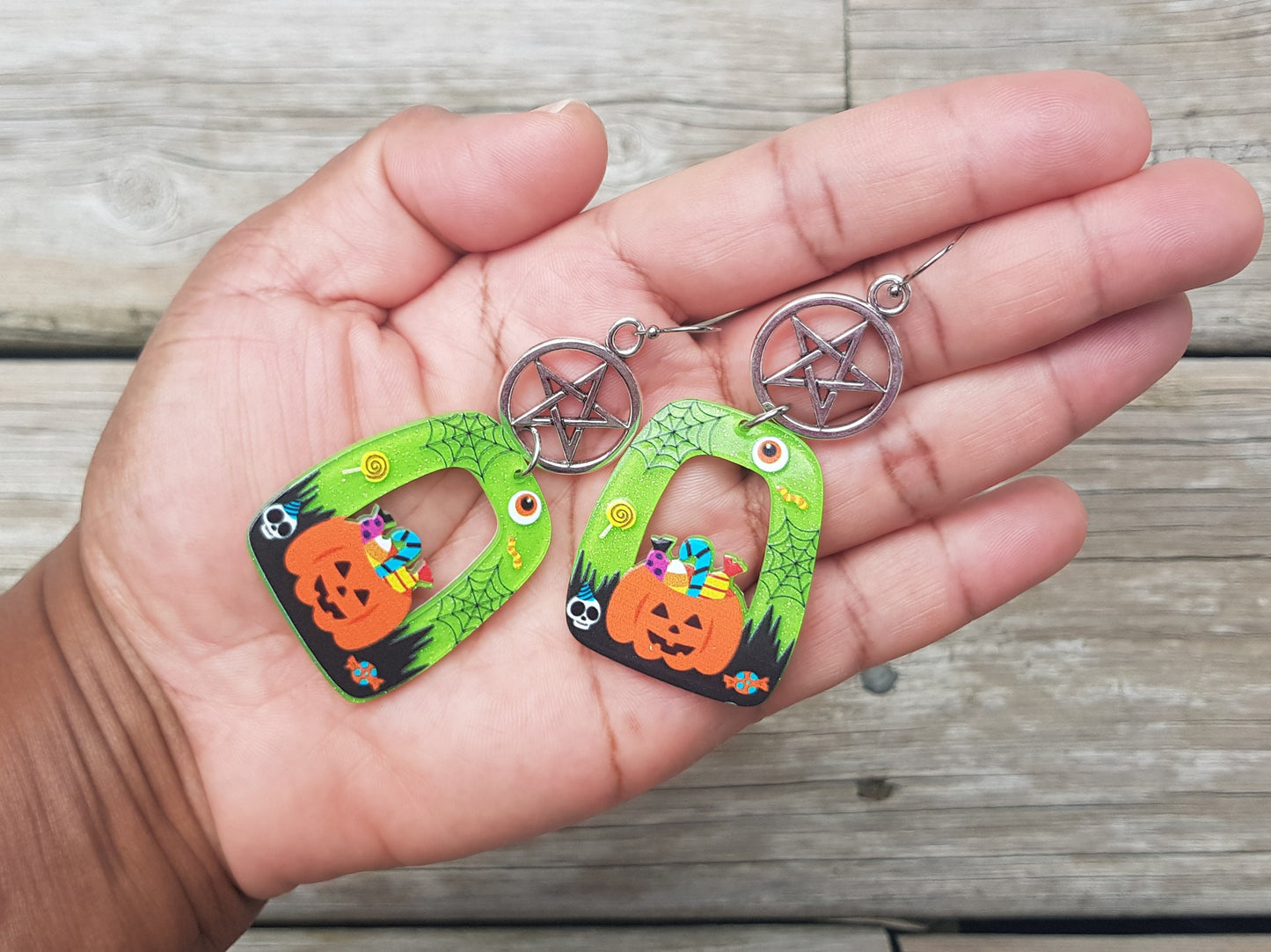 Orange, black and fluorescent green earrings.