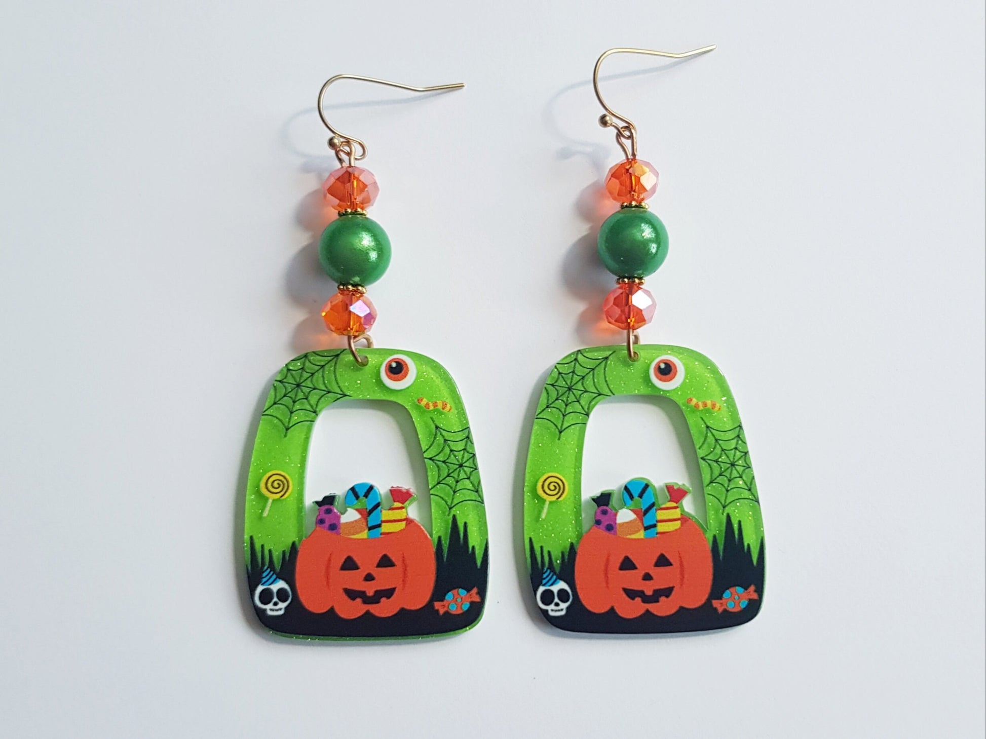 Jack o lantern earrings with hypoallergenic ear wires.