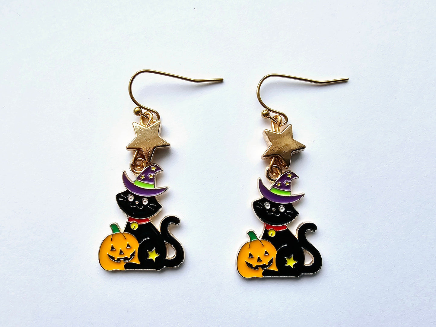 Black cat with wizard hats and jack o lantern earrings. Hypoallergenic ear wires.