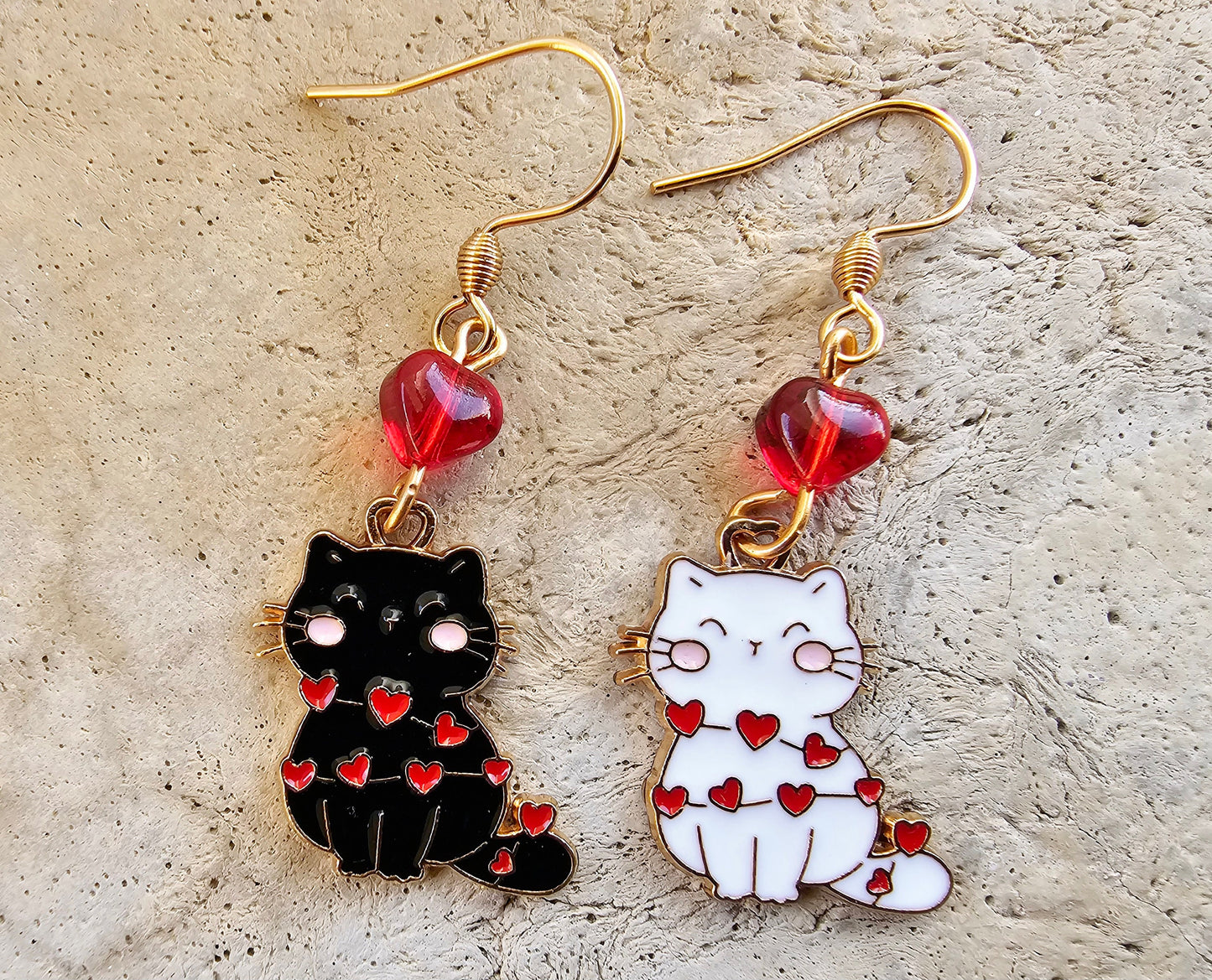 Red heart earrings with kitty cats.