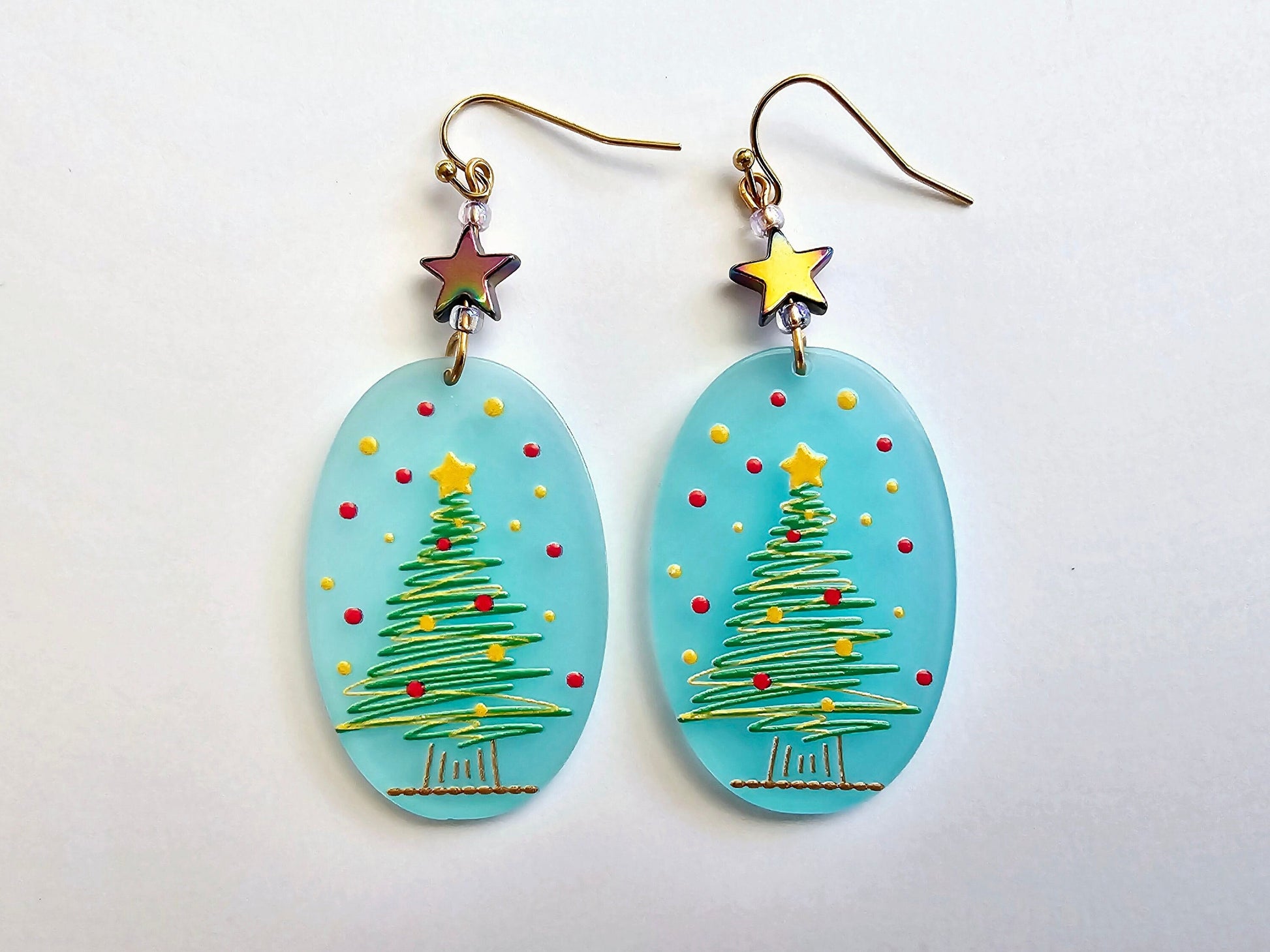 Pastel blue Christmas earrings with hypoallergenic ear wires.