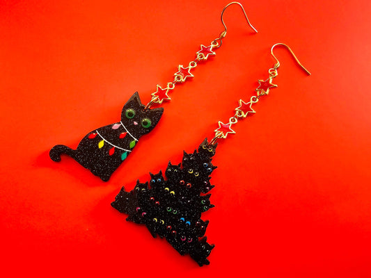 Cat earrings with hypoallergenic ear wires.