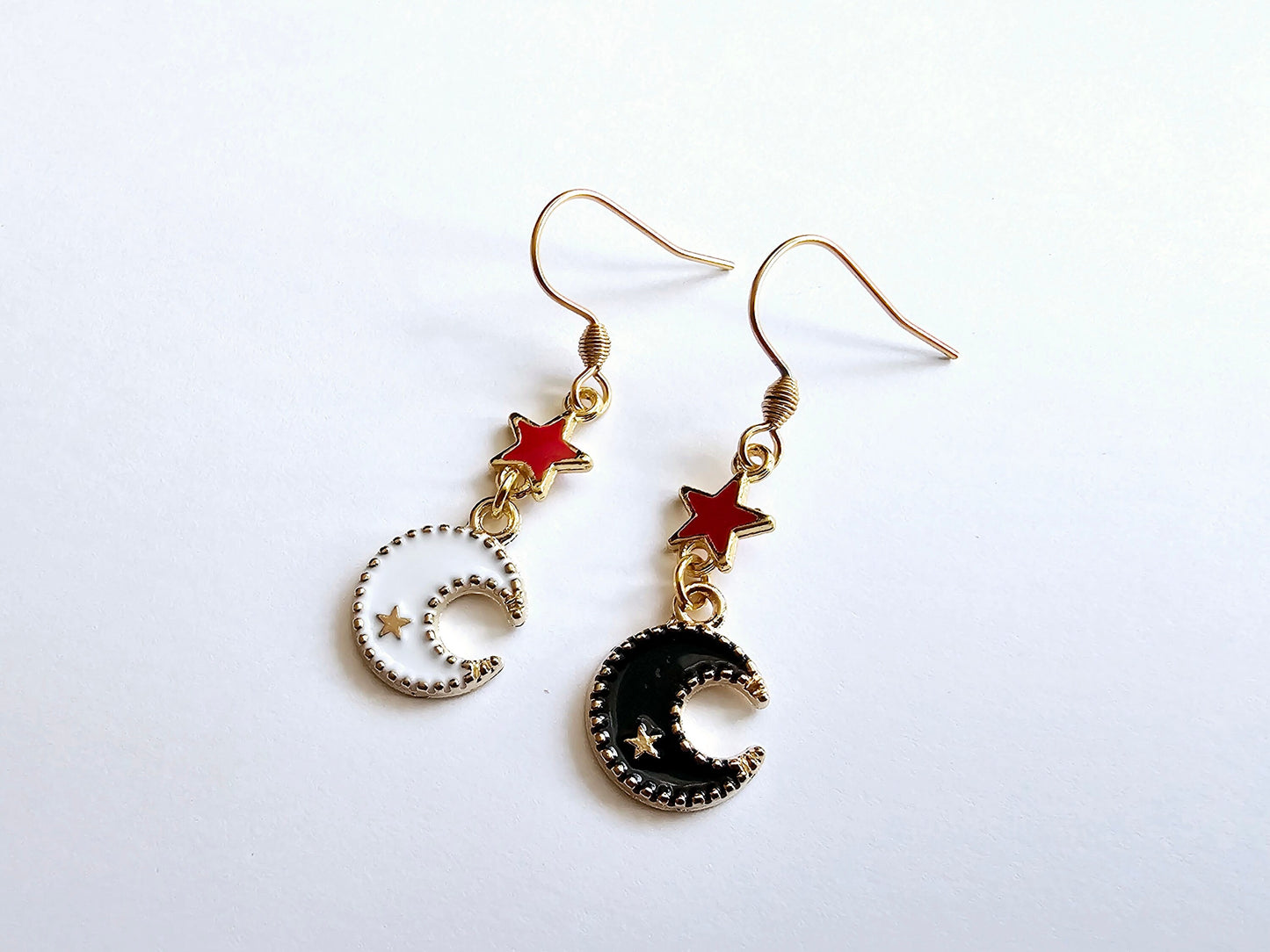 Red star and moon earrings.